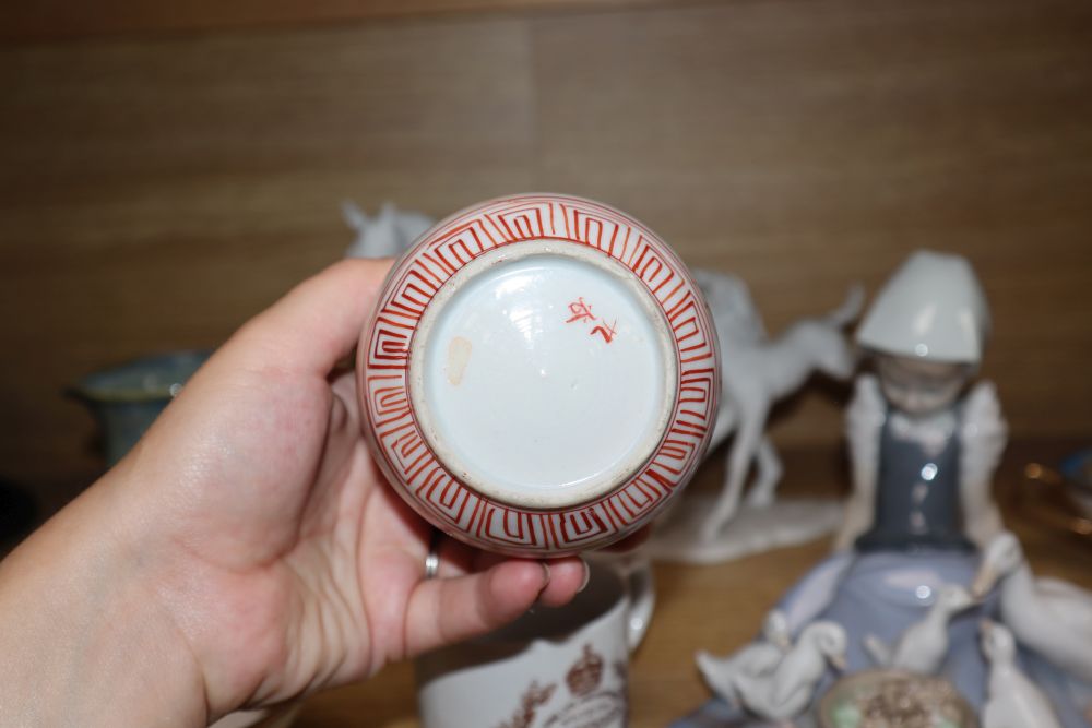 Four Noritake teacups and a Lladro girl with ducks, etc.